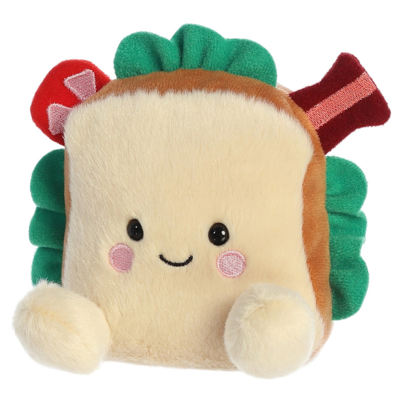 Palm Pals AURORA Palm Pals Plī&scaron;a rotaļlieta sviestmaize Tomass, 12 cm